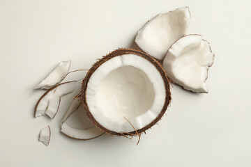 Fresh tasty coconut on white background, top view