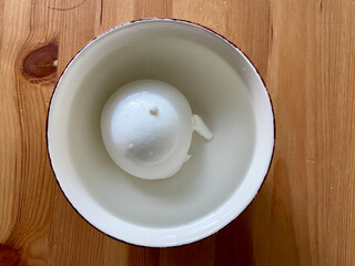 Burrata Cheese in Water with Ceramic  Bowl. Ready to Serve and Eat.