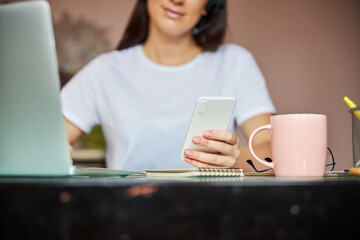 Woman is texting on her mobile phone