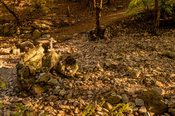 Obraz premium Pebble stack in dry riverbed.