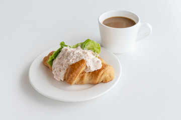 cup of coffee and croissant