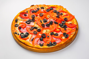 Pepperoni pizza on a white background. Traditional Italian pizza with tomatoes and meat isolated on white.