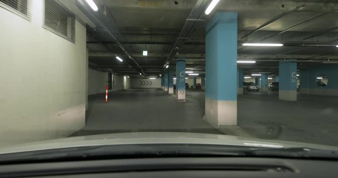Underground parking lot, empty, lots of emty spot for parking space
