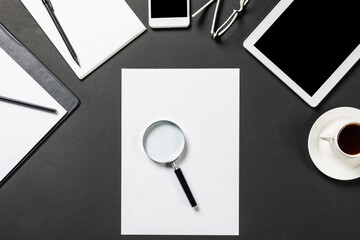Top view of modern workplace with blank paper