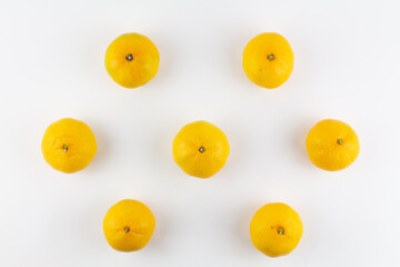 beautiful ripe tangerines on a white background