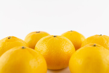 beautiful ripe tangerines on a white background