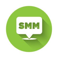 White SMM icon isolated with long shadow. Social media marketing, analysis, advertising strategy development. Green circle button. Vector.