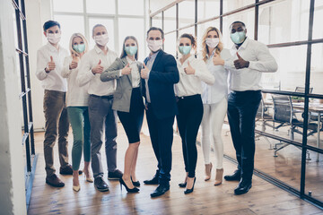 Full size photo of business people office eight members raise thumb fingers success medical respiratory office indoors