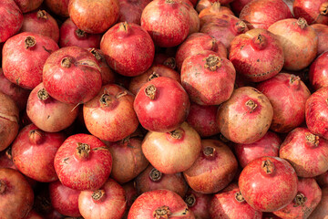 many pomegranate in fruit market