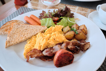 Closed-up Top-view of American Breakfast, Sausage, Omlete, Bacon ,Vegetable