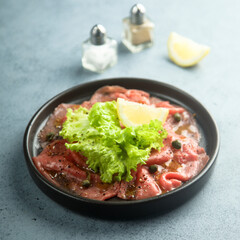 Traditional homemade beef carpaccio