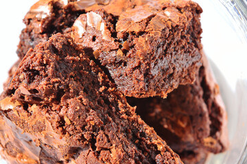 Pieces of chocolate brownie. Close up. Top vew. Isolated on white