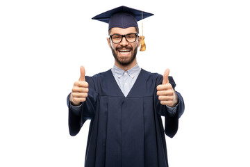 education, graduation and people concept - happy smiling male graduate student in mortar board and...