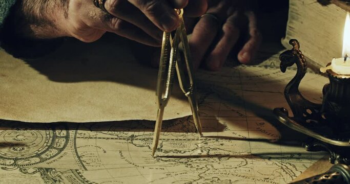Cartographer taking measurements with compass on ancient map (( by Claude Auguste Berey-Library of Congress In the Public Domain)