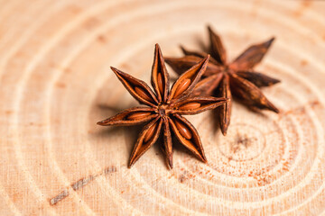 Star anise spice on wooden background