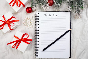 Fototapeta na wymiar Top view of blank notebook for to do list and christmas decoration