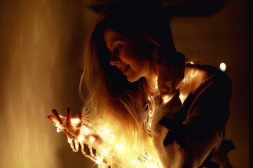 cozy Christmas evening girl / home New Year evening, model in a cozy house, evening light