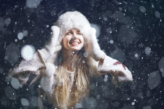 Christmas Winter Portrait Girl In A Hat / Snow Background Beautiful Model In Winter Style, Christmas Sales