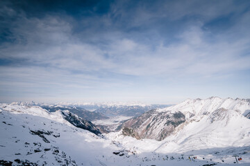 Fototapeta na wymiar Panorama of the ski resort Zell am See. Ski slopes in Kaprun on the Gletscher glacier. Winter landscape in the alps. Austria
