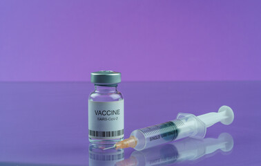 Coronavirus vaccine vial and medical syringe