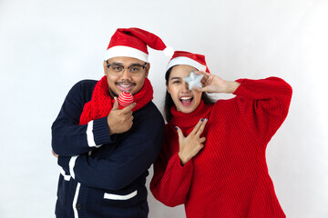 asia couple smile together wearing santa hat on white background