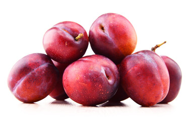 Composition with plums isolated on white background