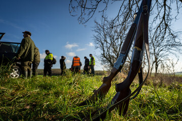 Rifle in front hunters.