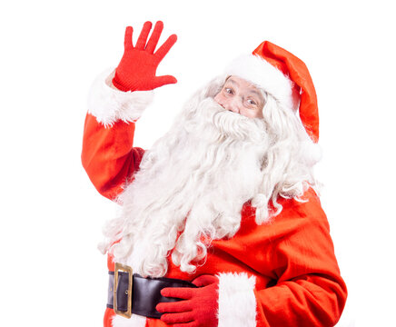 A cheerful Santa Claus waving his hand to the camera, isolated on white background.