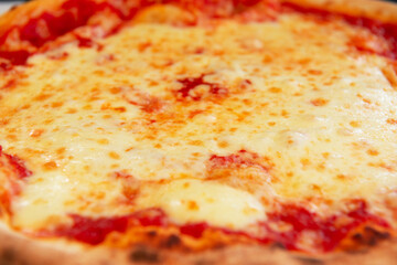 Delicious tasty traditional italian pizza Margarita - mozzarella cheese, tomatoes and crispy dough...