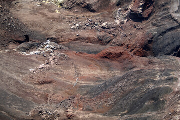 Fototapeta na wymiar Kamchatka. Gorely Volcano (Burnt Volcano). Colorful wall of the volcano crater. Spots of yellow sulfur on the rock. Archive photo, 2008