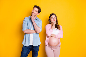Photo of young think couple stand look empty space pregnant woman wear casual cloth isolated on...