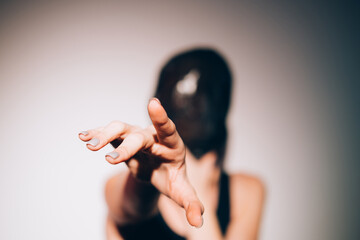 Woman protection. Female rights. Social isolation. Art portrait of suffering woman with head...