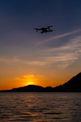 Fototapeta na wymiar Drone flying above Iseo Lake at sunset