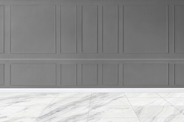 Gray patterned wall mockup with marble floor