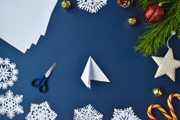 Step-by-step instructions. The snowflake is made of paper. Step 5 bend the sheet from the left....