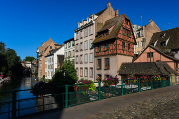 Old town water canal of Strasbourg, Alsace, France. Traditional half timbered houses of Petite France at dawn