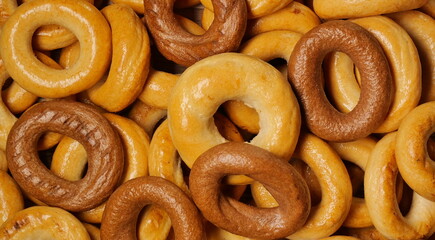 Background from chocolate and regular bagels. Handmade. Ready and eat at home.