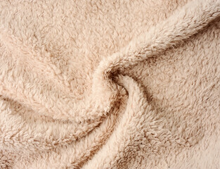 Artificul fur beige color close up.