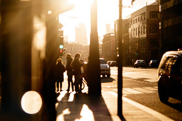 People on street with beautiful evening light, Moscow, Russia.