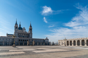 Obraz premium Beautiful view of Cathedral of La Almudena in Madrid on bright blue sky