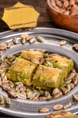 World famous baklava making in Gaziantep. Baklava presentation on wooden board. 