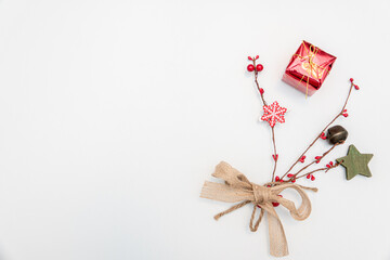 christmas gift with gold and red balls bow isolated on white background