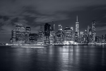 Fototapeta na wymiar Panorama new york city at night in monochrome blue tonality