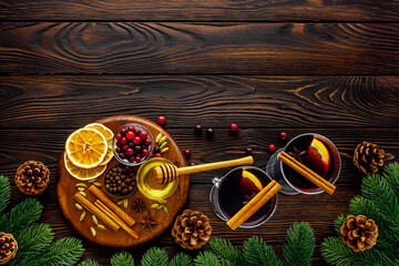 Mulled wine recipe - ingredients for Christmas hot drink in glasses