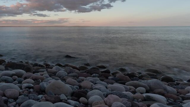 Beautiful rocky beach at sunset. Southern Norway, time lapse footage
