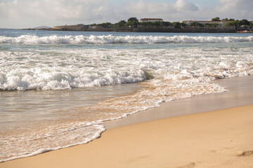 Ocean surf on the beach of Copacabana. Rio de Janeiro, February 2020