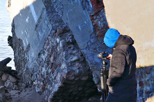 The Photographer Adjusts The Exposure Of The Camera. Local Tourism Development.