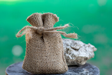 Small linen bag on blur background
