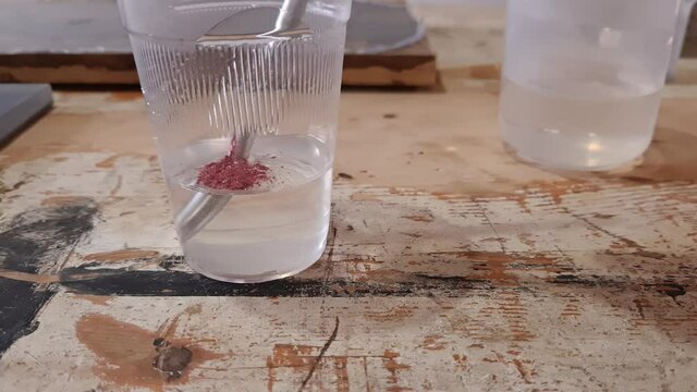 Mixing Epoxy Resin with Merlot Pigment. Crystal clear epoxy for art work.