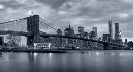 Fototapeta na wymiar Panorama new york city at night in monochrome blue tonality